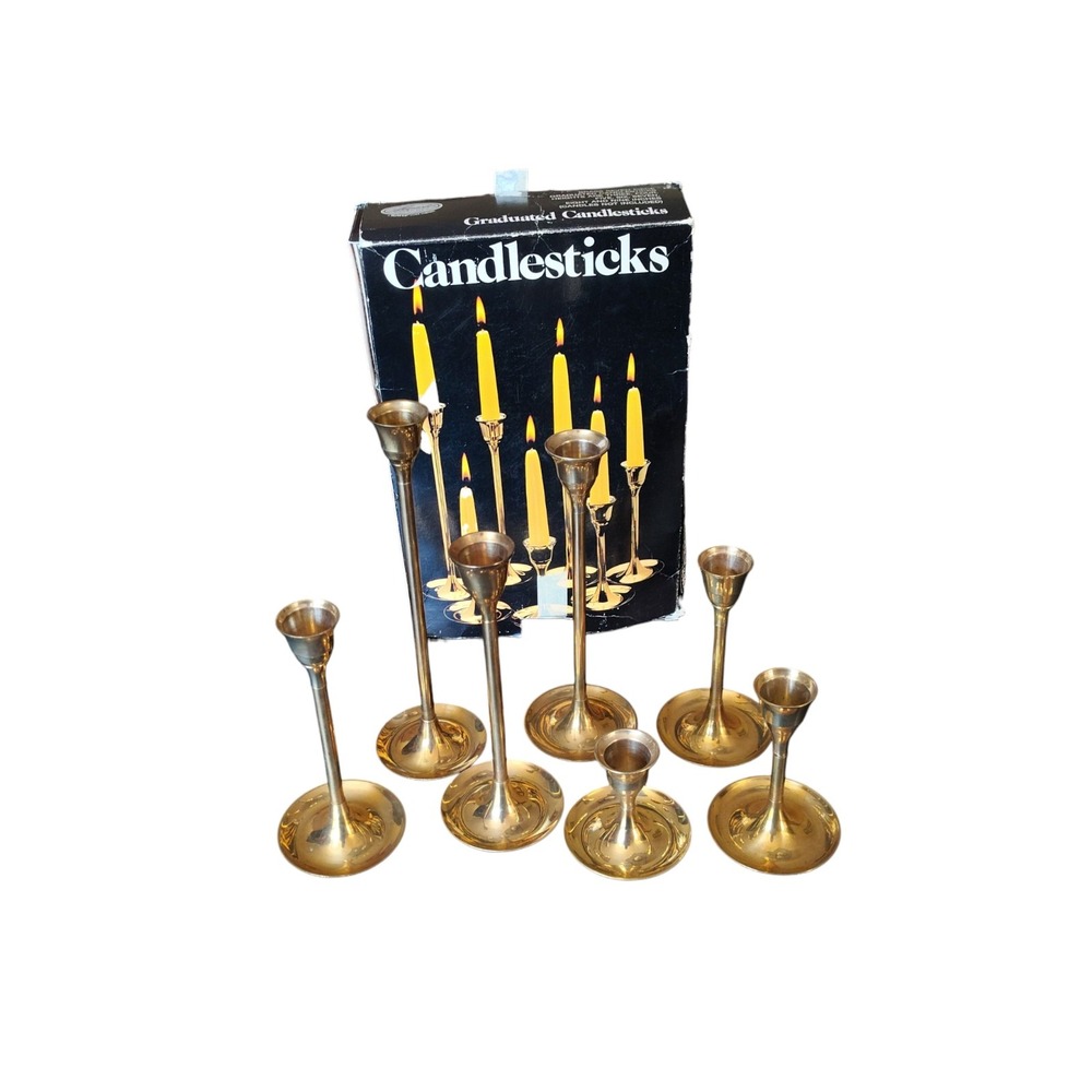 Vintage 7 Pc Brass Candle Holder Set
Graduating Sizes